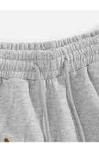 Calça moletom Caramelo Club