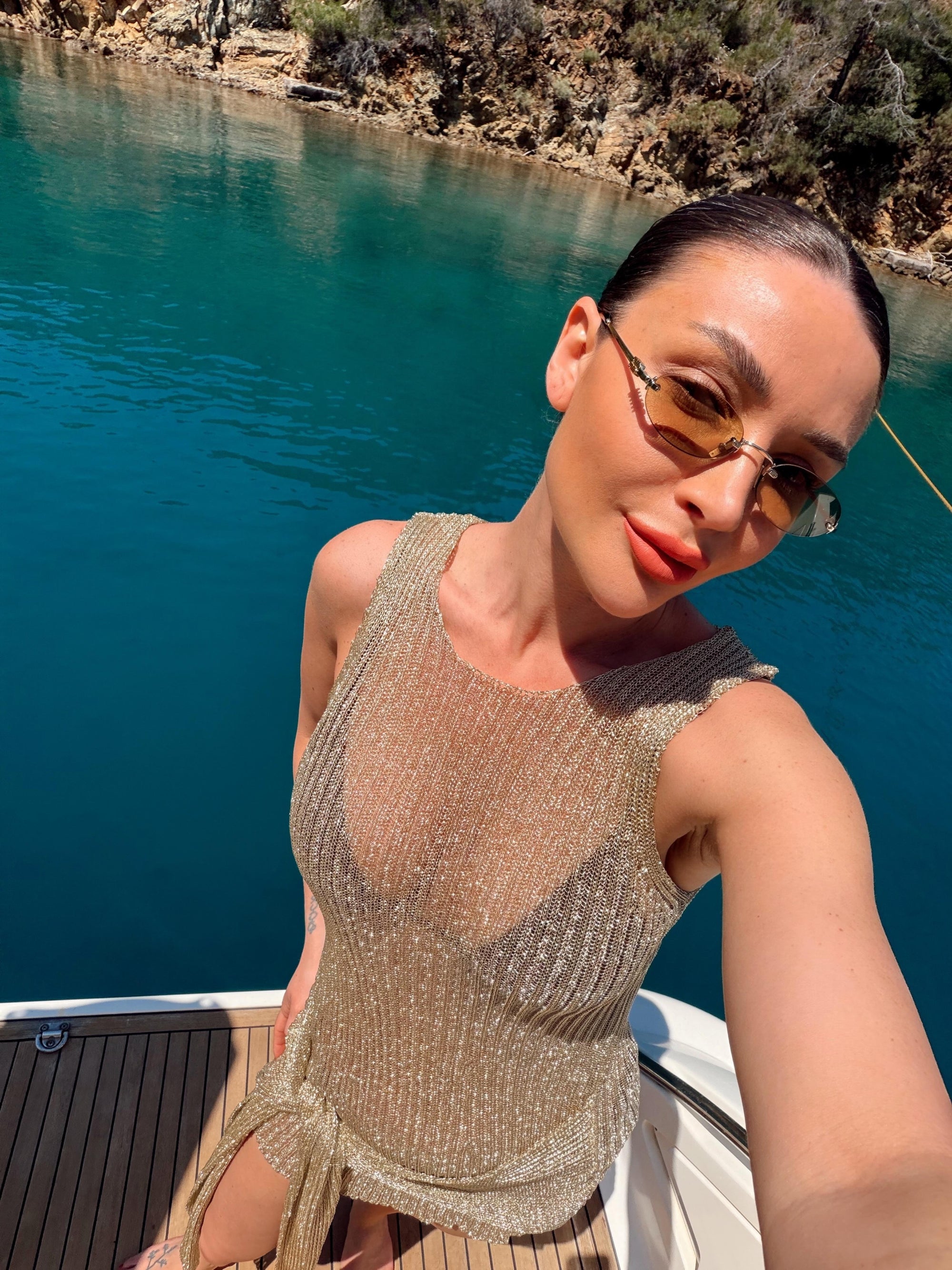 Saída Capri Dourada